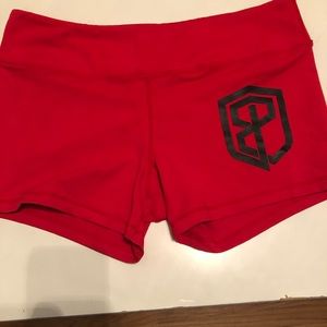 Born primitive red booty shorts